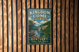 A vintage-style metal sign for Kingdom Come State Park in Kentucky, featuring a scenic landscape with a river and mountains.