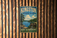A vintage metal sign for Kingston State Park in New Hampshire, featuring a scenic landscape with a lake and mountains.