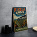 A vintage-style metal sign for Kinzua Bridge State Park in Pennsylvania, featuring an illustration of the bridge and surrounding landscape.