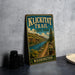 A vintage-style metal sign for Klickitat Trail State Park in Washington, featuring a scenic mountain landscape and a trail marker.