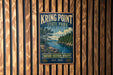 A vintage-style metal sign for Kring Point State Park in New York, featuring a scenic landscape with pine trees, a lake, and mountains.