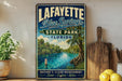 A vintage-style sign for Lafayette Blue Springs State Park in Florida, featuring a scenic image of the park's natural surroundings.