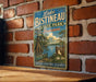 A vintage-style metal sign for Lake Bistaineau State Park in Louisiana, featuring a scenic illustration of the park's natural beauty and outdoor activities.
