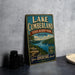 A vintage-style metal sign for Lake Cumberland State Resort Park in Kentucky, featuring a scenic landscape with a lake, mountains, and a boat.