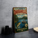 A vintage-style sign for Lake Dardanelle State Park in Arkansas, featuring a scenic illustration of a lake, mountains, and boats.