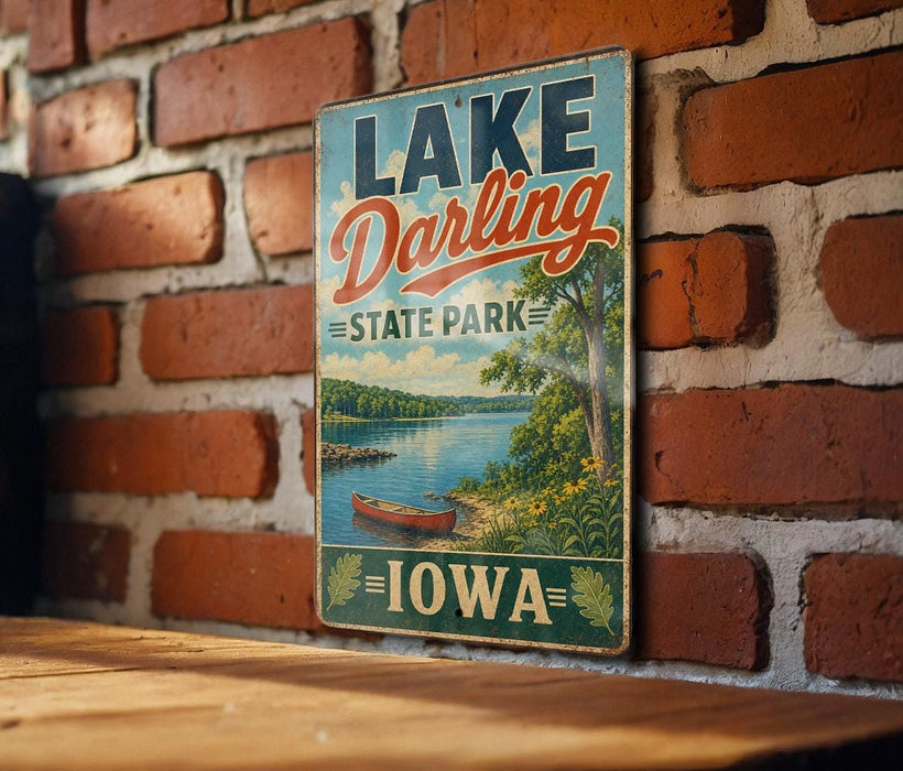 A vintage-style metal sign for Lake Darling State Park in Iowa, featuring a scenic illustration of a lake and surrounding landscape.