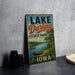 A vintage-style sign for Lake Darling State Park in Iowa, featuring a scenic illustration of a lake, canoe, and surrounding landscape.