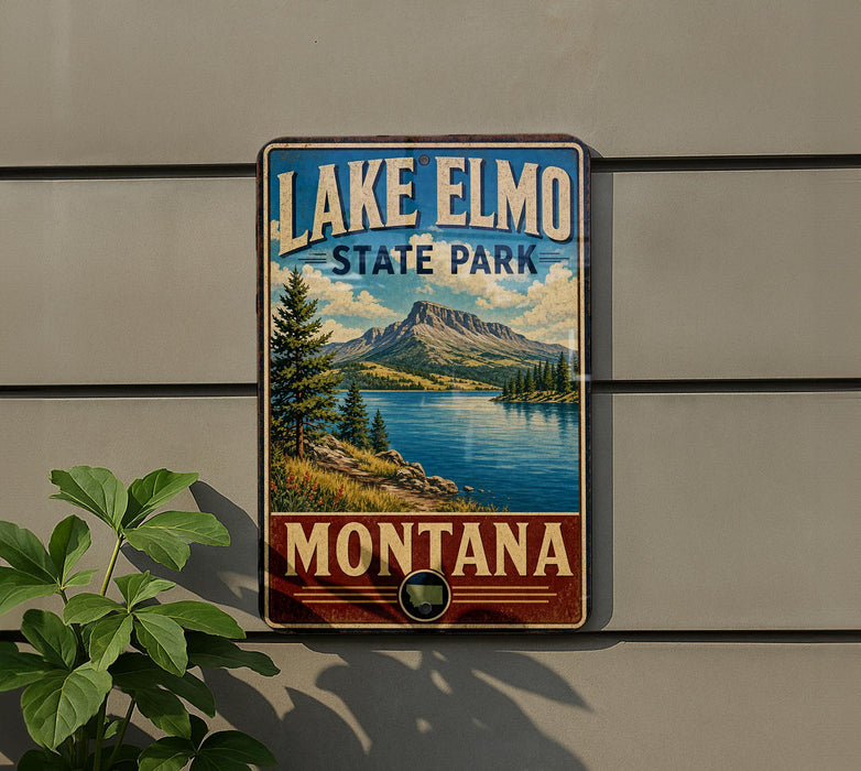A vintage-style sign for Lake Elmo State Park in Montana, featuring a scenic landscape with mountains, a lake, and pine trees.