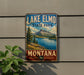 A vintage-style sign for Lake Elmo State Park in Montana, featuring a scenic landscape with mountains, a lake, and pine trees.