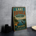 A vintage-style sign for Lake Eufaula State Park in Oklahoma, featuring a scenic landscape with a lake, mountains, and an eagle in flight.