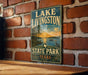 A vintage-style sign for Lake Livingston State Park in Texas, featuring a scenic landscape with a lake, trees, and a sunset.