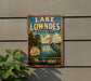 A vintage-style metal sign for Lake Lowndes State Park in Mississippi, featuring a scenic illustration of a heron and a lake surrounded by trees.