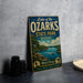 A vintage-style metal sign for Lake of the Ozarks State Park in Missouri, featuring a scenic landscape with a lake, mountains, and a boat.