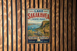 A vintage metal sign for Lake Sakakawea State Park in North Dakota, featuring a scenic landscape with a river, mountains, and a bighorn sheep.