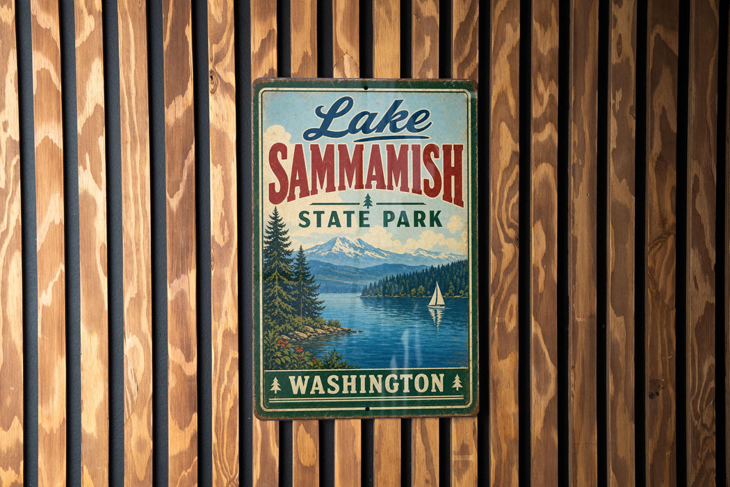 A vintage metal sign for Lake Sammish State Park in Washington, featuring a scenic landscape with a lake, mountains, and a sailboat.