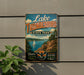 A vintage-style sign for Lake Thunderbird State Park in Oklahoma, featuring a scenic image of a lake, mountains, and a sailboat.