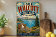 A vintage-style sign for Lake Walcott State Park in Idaho, featuring a scenic landscape with mountains, a lake, and a wooden sign displaying the state of Idaho.