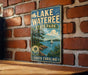 A vintage-style sign for Lake Wateree State Park in South Carolina, featuring a scenic illustration of a lake, trees, and a sailboat.