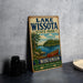 A vintage-style metal sign for Lake Wissota State Park in Wisconsin, featuring a scenic illustration of a lake, canoe, and trees.