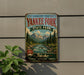 A vintage-style metal sign for the Land of the Yankee Fork State Park in Idaho, featuring a scenic mountain landscape with a river and pine trees.