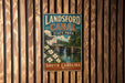 A vintage-style metal sign for Landsford Canal State Park in South Carolina, featuring a scenic illustration of the canal and surrounding landscape.