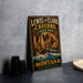 A vintage metal sign for Lewis and Clark Caves in Montana, featuring an illustration of the cave system and mountains.