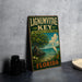A vintage-style metal sign for Lignum Vitae Key, a botanical state park in Florida, featuring a bird and tropical foliage.