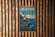 A vintage-style metal sign for Lime Kiln Point State Park in Washington, featuring a lighthouse and a whale in the ocean.