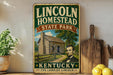 A vintage-style sign for Lincoln Homestead State Park in Kentucky, featuring an illustration of a log cabin and a portrait of Abraham Lincoln.