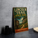 A vintage-style metal sign for the Lincoln Trail State Park in Illinois, featuring a scenic illustration of a trail surrounded by nature.