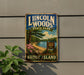 A vintage metal sign for Lincoln Woods State Park in Rhode Island, featuring a scenic landscape with a lake, trees, and a sign indicating the park's location.