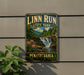A vintage-style metal sign for Linn Run State Park in Pennsylvania, featuring a scenic image of a waterfall surrounded by nature.