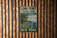 A vintage metal sign for Long Point State Park on Lake Chautauqua, featuring a scenic image of the park and the surrounding landscape.