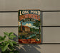 A vintage metal sign for Long Pond Ironworks State Park in New Jersey, featuring a scenic illustration of a building and a pond.