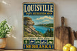 A vintage-style sign for the Louisville State Recreation Area in Nebraska, featuring a scenic landscape with a lake and mountains.