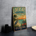 A vintage-style sign for "Lovers Key State Park" in Florida, featuring a beach scene with a crane and palm trees.