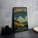 A vintage-style metal sign for Ludington State Park, Michigan, featuring a lighthouse and beach scene.