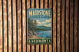 A vintage metal sign for Maidstone State Park in Vermont, featuring a scenic landscape with pine trees, a lake, and mountains.