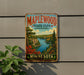 A vintage-style metal sign for Maplewood State Park in Minnesota, featuring a scenic landscape with a lake, mountains, and autumn foliage.