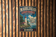 A vintage-style metal sign for Marblehead Lighthouse State Park in Ohio, featuring a lighthouse and a scenic landscape.