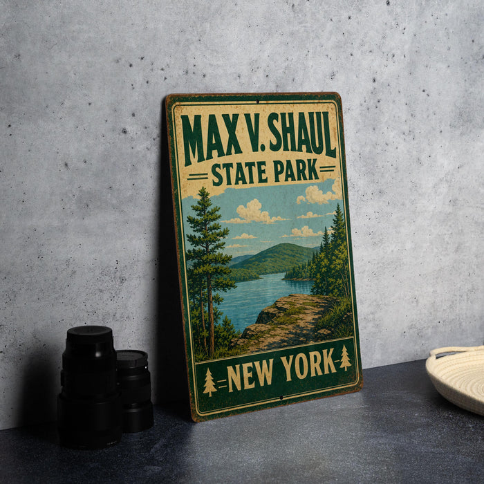 A vintage-style sign for Maxx V. Shaul State Park in New York, featuring a scenic landscape with pine trees, a lake, and mountains.