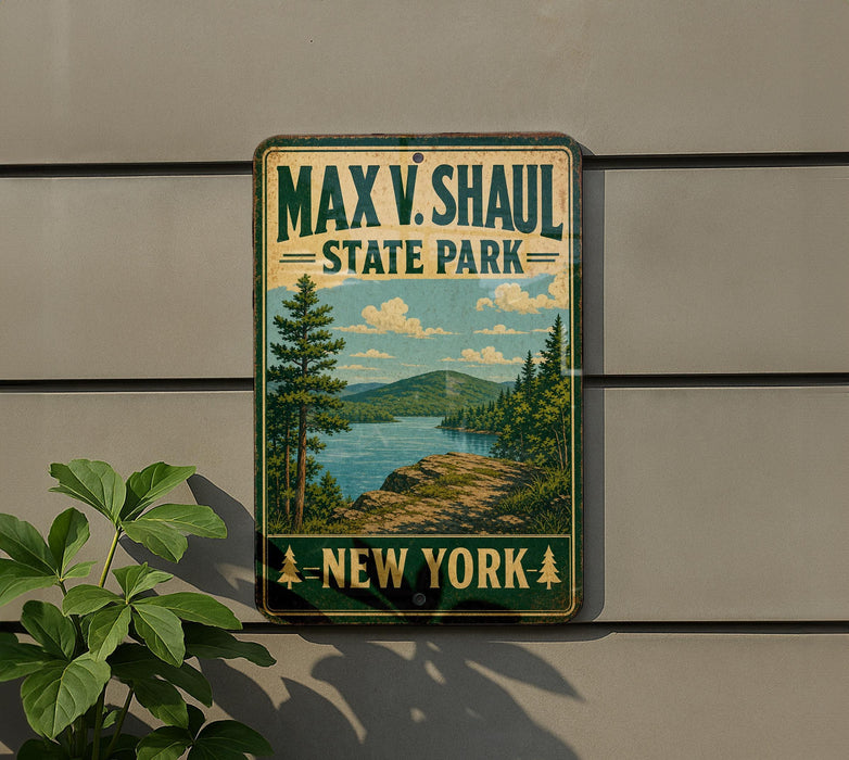 A vintage-style metal sign for Max V. Shaul State Park in New York, featuring a scenic landscape with pine trees, a lake, and mountains.