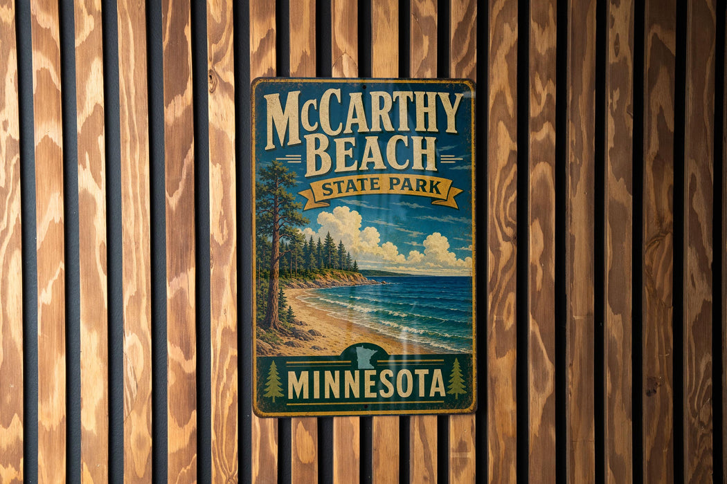 A vintage-style metal sign for McCarthy Beach State Park in Minnesota, featuring a scenic landscape with pine trees, a beach, and a lake.