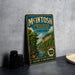 A vintage-style sign for Mcintosh Woods State Park in Iowa, featuring a scenic illustration of a forest and a river.