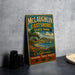 A vintage-style metal sign for McLaughlin Eastshore State Park, featuring a scenic landscape with a sailboat, mountains, and a beach.
