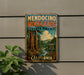 A vintage metal sign for Mendocino Woodlands State Park in California, featuring a scenic illustration of the park's natural surroundings.