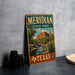 A vintage-style metal sign for Meridian State Park in Texas, featuring a scenic landscape with mountains, trees, and a river.