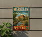 A vintage-style metal sign for Meridian State Park in Texas, featuring a scenic landscape with mountains, a river, and desert vegetation.
