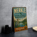 A vintage metal sign for the Merkle Natural Resources Management Area in Maryland, featuring an illustration of a bird and a river.