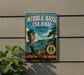 A vintage-style metal sign for Middle Bass Island, Ohio, featuring a scenic landscape with a rock formation, lake, and a lighthouse.